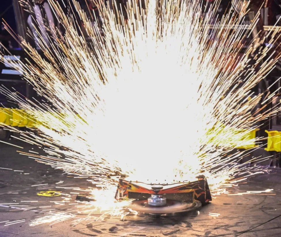 Fusion combat robot throwing sparks in the arena